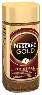 Nescafé Gold Original front jar on white surface showing label and premium look