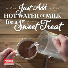 Nestle Hot Cocoa powder close-up showing fine texture for smooth dissolving