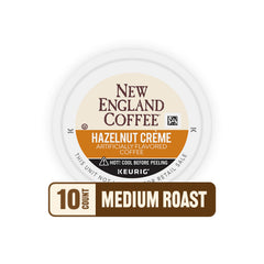 New England Coffee pod next to a ruler showing size and single‑serve convenience