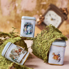New English Teas tins arranged in a tea setting, conveying British charm and ready-to-serve benefit