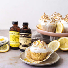 pouring lemon extract into measuring spoon to show Nielsen-Massey precise usage benefit