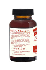Nielsen-Massey spoonful of paste over custard showing flavor boost and specked finish
