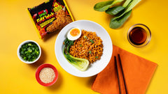 Nissin Fire Wok opened cup showing seasoning and infused noodles for flavor