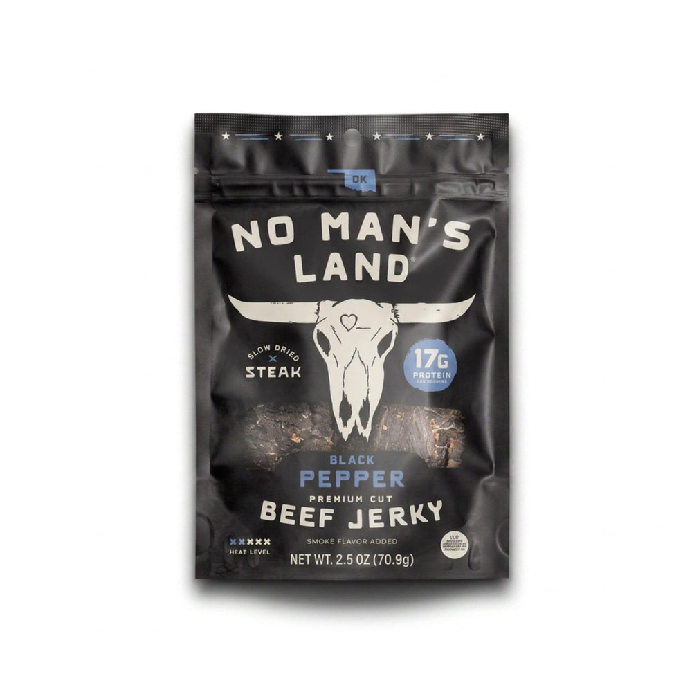 No Mans Land front packaging showing black pepper flavor and portable convenience