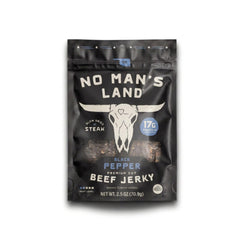 No Mans Land front packaging showing black pepper flavor and portable convenience