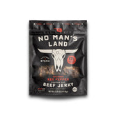 No Man's Land front pack 5oz showing spicy beef jerky and branding for grab-and-go fuel