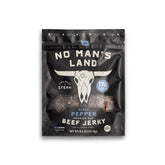 No Mans Land front packaging showing bold branding and flavor