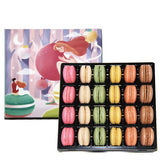 Noble Createaprototype gift box front view showing whimsical illustration and 24 macarons