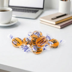 NOWDIET open tub with candies and spoon showing portion size convenience