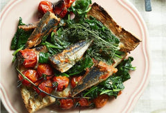 NURI open can top view revealing whole sardines in spiced tomato sauce, ready-to-eat