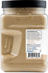Nutricost reconstituted oat milk in glass, creamy pour for coffee and smoothies