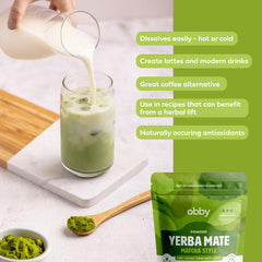 obby matcha-style mate latte in ceramic cup with froth, creamy comforting energy