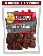 Old Trapper front packaging showing clear pouch and spicy beef benefit portability