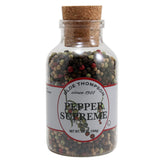 Olde Thompson front jar showing mixed peppercorns and shelf-ready design benefit