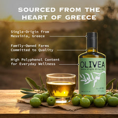 OLIVEA bottle beside citrus and herbs for scale and serving inspiration
