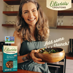 Olivia's croutons tossed on a Caesar salad adding savory crunch