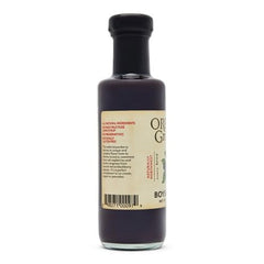 Close-up of boysenberry syrup texture highlighting Oregon Growers rich pour