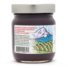 Close-up spoonful of Oregon Growers marionberry spread showing thick texture