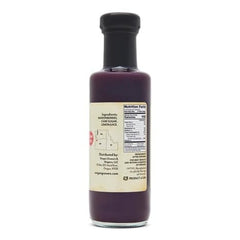 Oregon Growers marionberry syrup drizzled on pancakes adding fruity sweetness