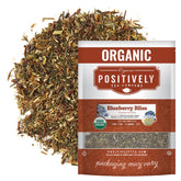Organic Positively Tea front packaging showing blueberry rooibos and benefits