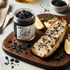 osmo sprinkled on grilled white fish adding texture and flavor finish