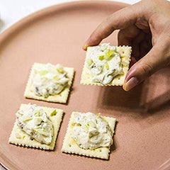 Otter Kingdom close-up of smoked oyster texture and color, highlights firm meat and smoky finish