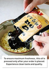 K FOOD Paldo prepared bowl top view highlighting glossy sauce coverage