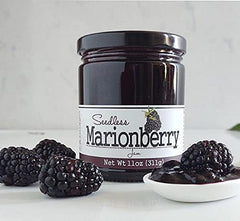 Paradigm Foodworks jar next to fresh marionberries showing real-fruit authenticity benefit