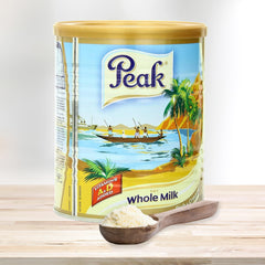 Wooden spoon scooping Peak powder demonstrating portioning convenience and no clumps