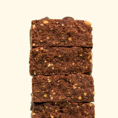 Perfect Bar unwrapped chocolate brownie bar closeup highlighting creamy texture