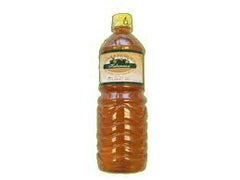 Pick-and-Squeeze bottle front view showing label and easy-pour cap for convenience