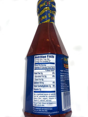 Pico Pica squeeze bottle in use drizzling hot sauce onto tacos for instant heat