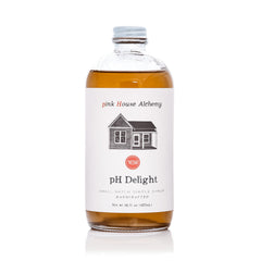 Pink House Alchemy front bottle showing 16 oz label and artisanal look benefits visibility