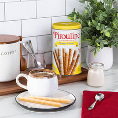 Pirouline wafer dipped in coffee adding crunch and lemon flavor