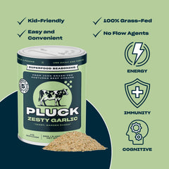 Pluck jar staged with fresh herbs and garlic, illustrating natural ingredients