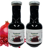 Pomegranaze front packaging showing two glass bottles and organic molasses benefit