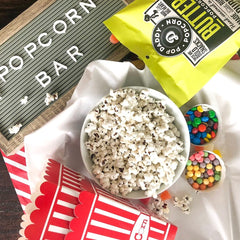 POP DADDY ·POPCORN· close-up on kernel texture showing light, crisp seasoning benefit