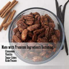 Pop'N Popcorn close-up of glazed pecan halves showing glossy cinnamon coating and crunchy texture
