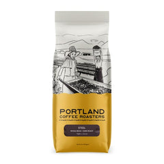 portland roasting front package showing steel espresso 32 oz, clear branding and benefit of bold flavor
