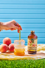 Portland Syrups syrup pouring into glass showing syrup consistency benefit: easy mixing