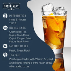Positively Tea loose leaf close-up revealing tea leaves and peach pieces