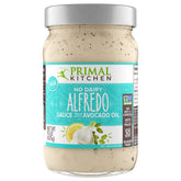 Primal Kitchen Alfredo sauce front-of-jar showing jar and lid with product benefit