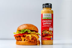 Primal Kitchen bottles beside fresh ingredients illustrating clean-label avocado oil benefit