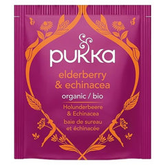 Pukka tea steeping in a cup with steam illustrating warming, soothing beverage