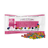 Pure Food by Estée front packaging showing colorful candy coated chocolate chips, vibrant appeal