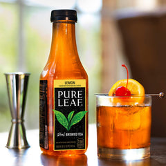 Pure Leaf Lemon bottle chilling on ice for refreshing citrus benefit