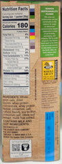 Quaker close-up of apples and cinnamon pieces in oatmeal, showcasing natural fruit flavor