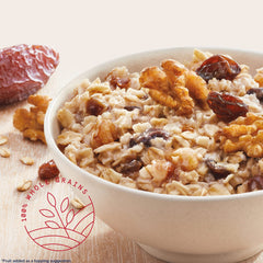 close-up of Quaker oatmeal texture with raisins dates and walnuts highlighting whole-grain appeal