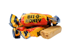 QUEEN CITY CANDY CAVE honey taffy texture with almond bits, visible flavor pieces
