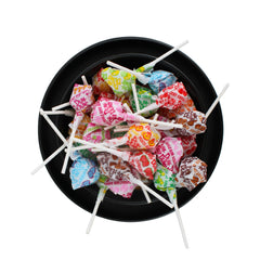 QUEEN CITY CANDY CAVE arranged flavor wrappers illustrating all included tastes